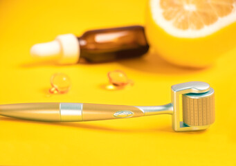 Dermaroller needle, serum . Anti wrinkle skin care. Derma roller, serum bottle. Beauty treatment, mesotherapy or medical collagen production stimulation. Vitamin C for face. meso therapy home use