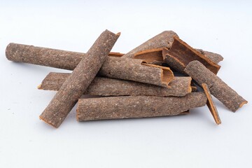 Cinnamon Stick, Dal Chini closeup isolated on white background
