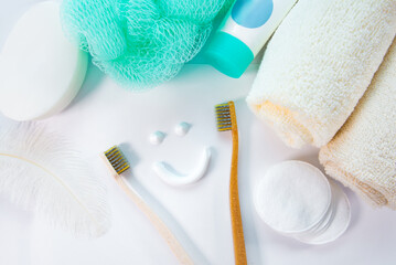 smiley face with toothpaste and hygiene products. Background. The concept of oral and body hygiene.