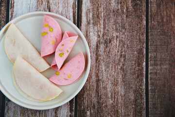 meat sausage with pieces of olives