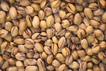 Delicious roasted pistachios as background