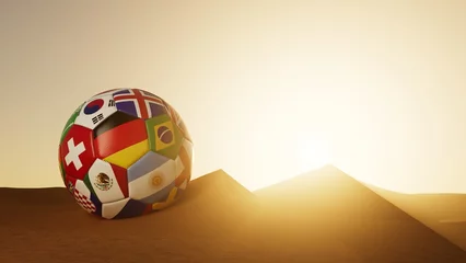 Fotobehang Großer Fußball zur WM in Wüste von Katar 2022 © Robert Kneschke