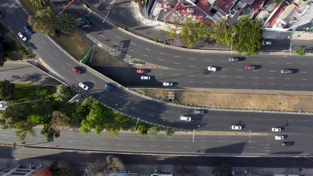 Top Down Shot Over the Junction of Viaducto and Rio Becerra Avenue, with Escandon Colony on the Top and Napoles Colony on the Bottom