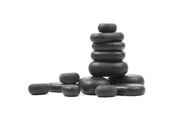 black spa stones isolated on white background .