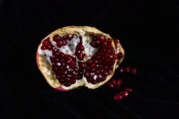 pomegranate on black background