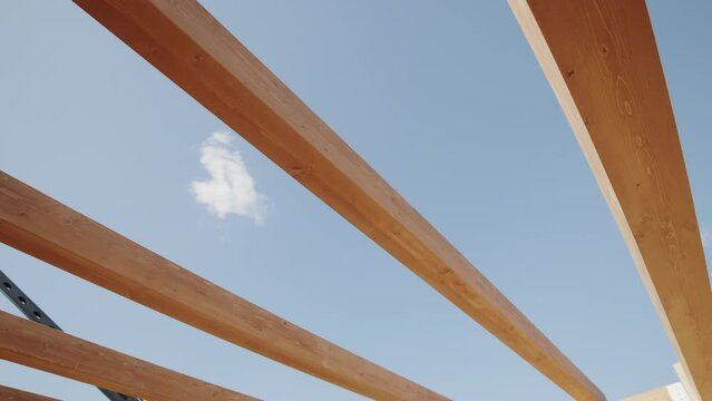 particular wooden beams with sky background