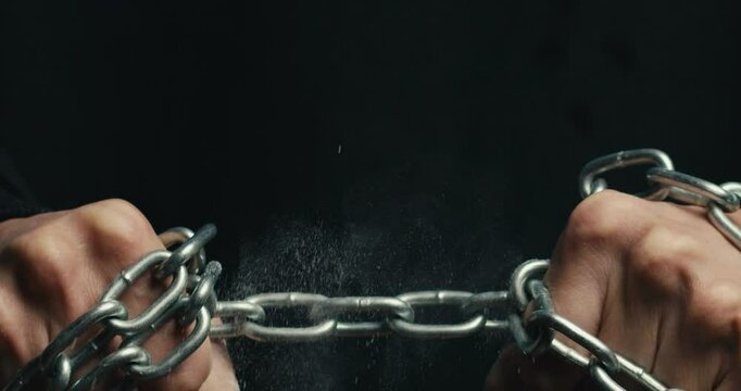 Hands Hold Iron Chain