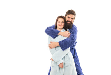 Couple in love in robes of happy guy hugging girl in morning isolated on white copy space, lovers.