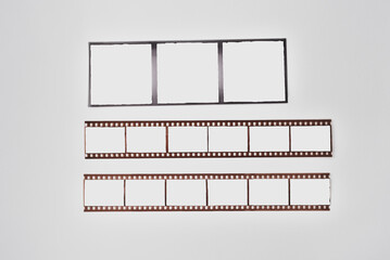Negative films in different formats with blank frames template for copy space