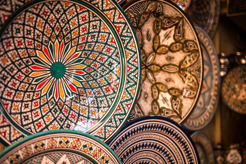 ceramic plates on a display at a traditional market