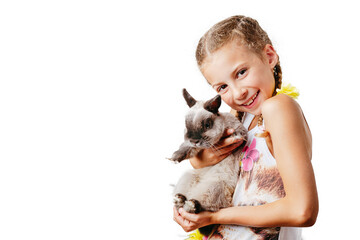 Little girl holding small rabbit in her hands, Isolated on white. Easter holiday