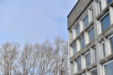 An old stone building with large windows
