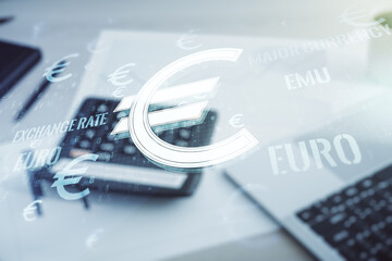 Virtual EURO symbols sketch on calculator and pc background, strategy and forecast concept. Multiexposure