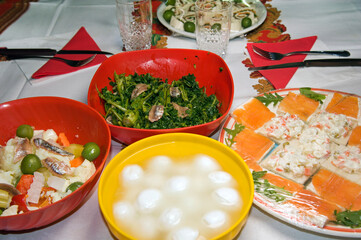 Some dishes on the table prepared for the New Year`s Eve dinner. Traditions of Southern Italy.
