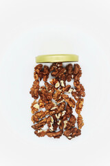 Shelled walnuts in the form of a jar with a lid