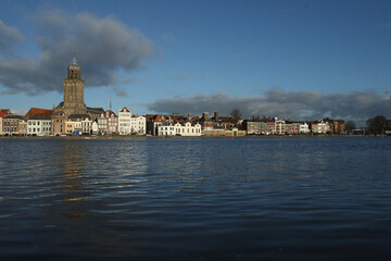 Obraz premium A view on the city of Deventer, the Netherlands, at the river IJssel with a high water level 