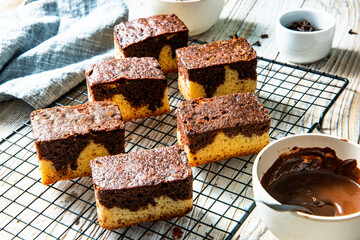 Chocolate marble cake square pieces. Serwing sweet dessert