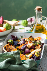 Grilled and roasted root vegetables with herbs. Healthy simple food