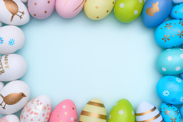 Colorful Frame of Easter eggs. Many decorative painted Easter eggs are arranged by color. Easter eggs Gradient with copy space.