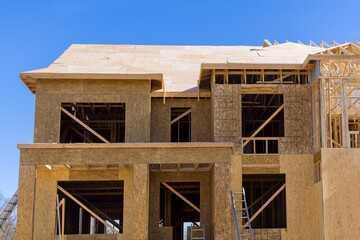 Framing of a new wooden house under construction
