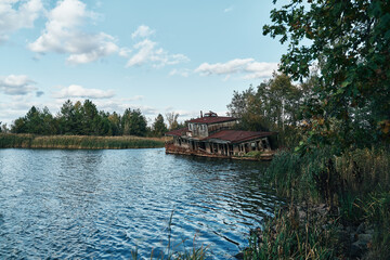 Abandoned floating boat restaurant in the harbour of ghost town Pripyat, Chernobyl, Ukraine. Ship