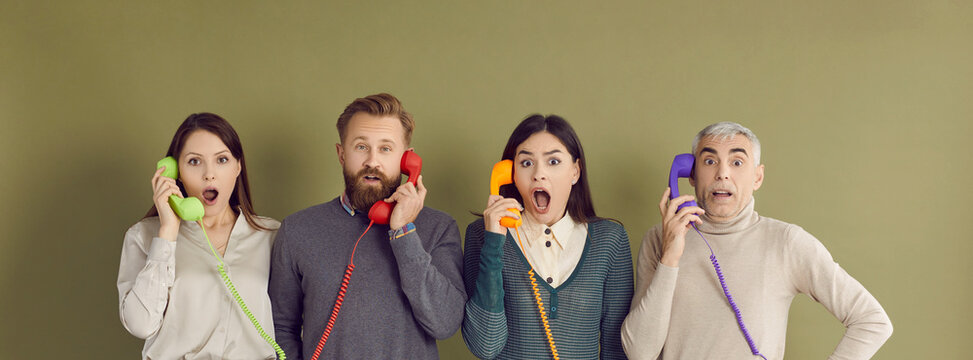 People get bad news over phone call. Four people of different ages and generations standing on green studio background and holding old retro telephone receivers with surprised shocked face expressions