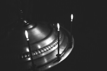 The sacrament of baptism. Three candles
