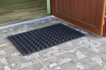 Door rubber mat,carpet on the doorstep at the entrance to the house