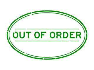 Grunge green out of order word oval rubber seal stamp on white background