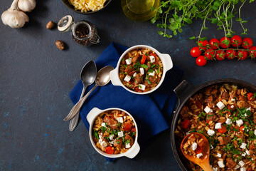 Traditional Greek cuisine. Lamb stew with feta cheese and vegetables.