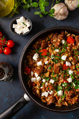 Traditional Greek cuisine. Lamb stew with feta cheese and vegetables.
