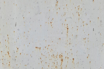 Texture of a gray metal wall with rusty spots.