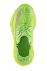 Green rag sneaker top view on a white background.