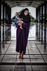 Naklejka premium woman in a dress in kuala lumpur malaysia