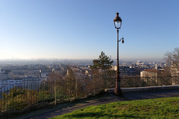 Paris panoramic view and  lamp post in the Montmartre hill