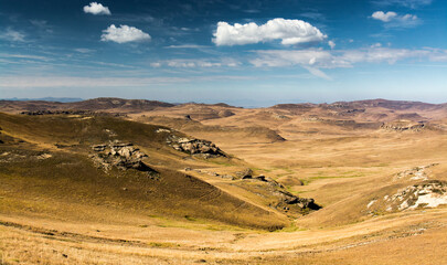 Travel to Lesotho. Landscape of mountains and grassy hills in Sehlabathebe National Park