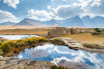 Travel to Lesotho. Ponds, grassland and rock formations and hills of Sehlabathebe National Park