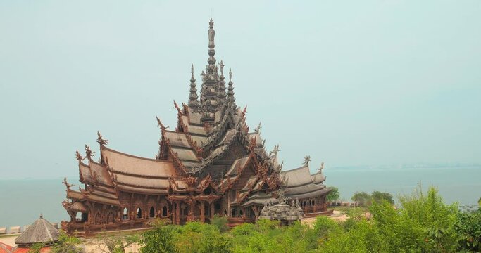 Sanctuary of Truth (Prasat Sut Ja-Tum), beautiful wooden temple by the sea on the outskirts of Pattaya Thailand, Amazing Thailand travel concept.