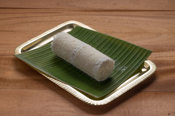 Fototapeta na wymiar Puttu /Raw rice puttu/Arisi Maavu Puttu -Kerala special breakfast items made using raw rice flour