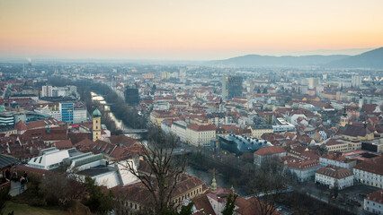  Top view on the town hall from the castle hill in Graz city. Traveling Austria