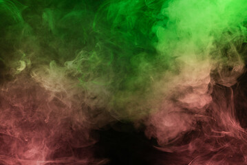 Green and pink steam on a black background.