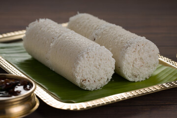 Fototapeta na wymiar Puttu/Raw rice puttu/Arisi Maavu Puttu -Kerala special breakfast items made using raw rice flour