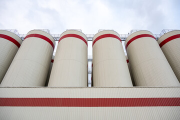 Fermentation tanks for making different types of beer in the Distillery.Giant stainless steel fermentation for industrial use.
