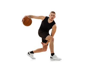 Fototapeta na wymiar Young muscled man, basketball player practicing with ball isolated on white studio background. Sport, motion, activity concepts.
