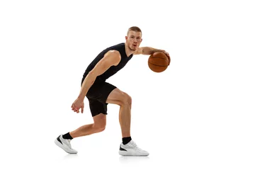 Foto op Canvas Young muscled man, basketball player practicing with ball isolated on white studio background. Sport, motion, activity concepts. © master1305