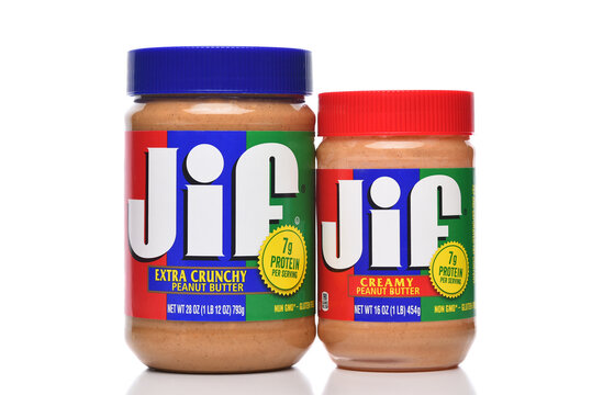 IRVINE, CALIFORNIA - 21 FEB 2022: Two jars of JIF Peanut Butter, Extra Crunch and Creamy.