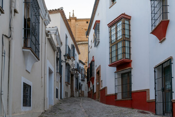Fototapeta na wymiar narrow street the historic old town of Ronda in Andalusia