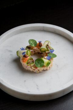 Delicious dish with crab and cucumbers