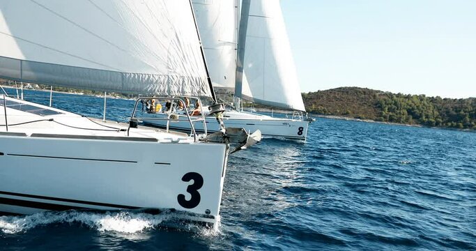Luxury yachts at Sailing regatta. Sailing in the wind through the Sea.