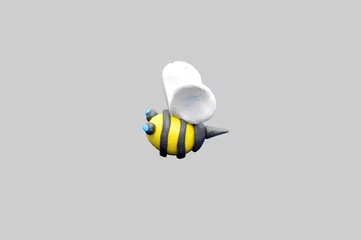 Foto auf Acrylglas a bee from plasticine is flying © Мария Иванова
